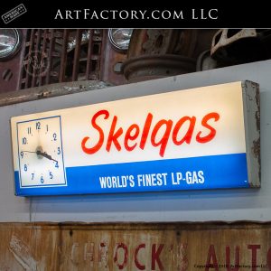 Skelgas lighted clock sign