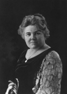 Head and shoulders photograph of Florence M. Sterling wearing a dress and a necklace