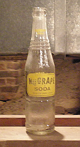 empty vintage NuGrape soda bottle