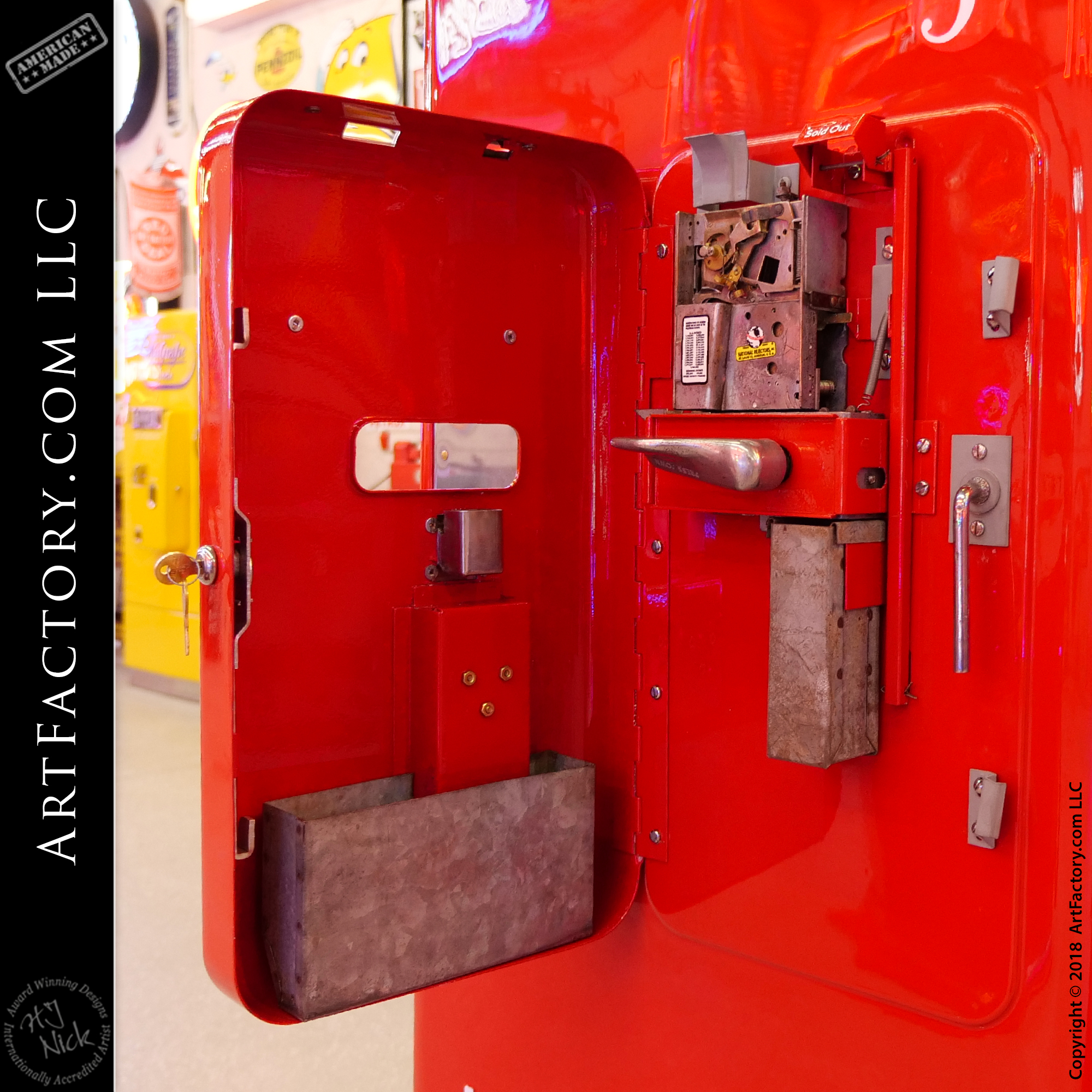 open coin slot on old Coca-Cola machine