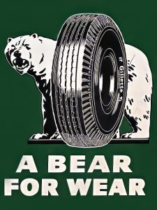 “A Bear For Wear” Gillette Tires Mascot Sign - Rare vintage advertising collectible featuring Gillette’s iconic polar bear emblem.